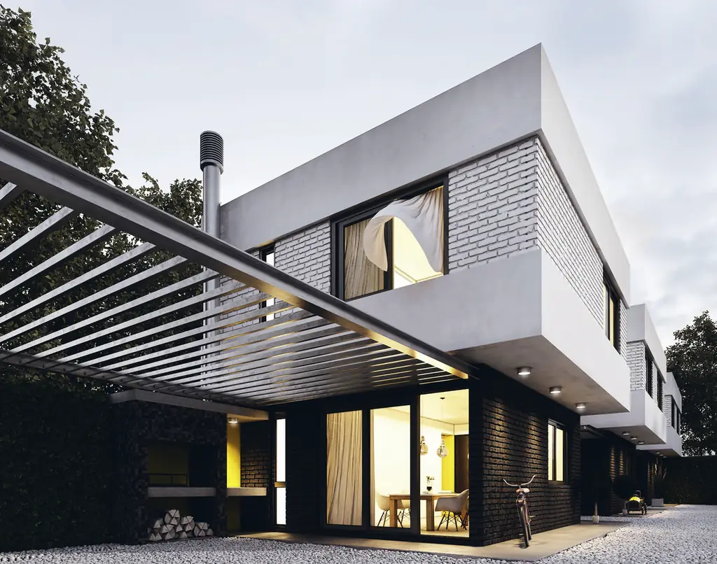 Maison contemporaine éclairée au crépuscule